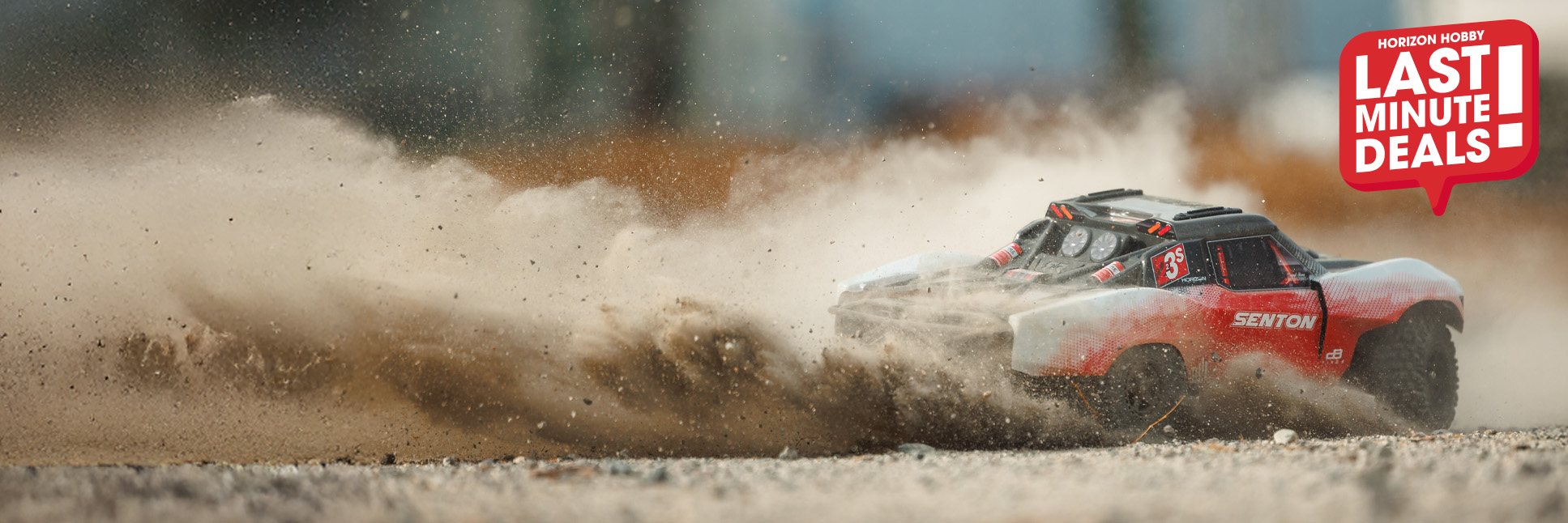 Action shot of the ARRMA 1/10 SENTON 223S DSC 4X4 Ready-to-Run Brushless Short Course RC Truck with the Last Minute Deals Logo