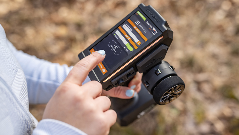 Lifestyle shot of the Spektrum iXSR+ 12-Channel DSMR+ Transmitter