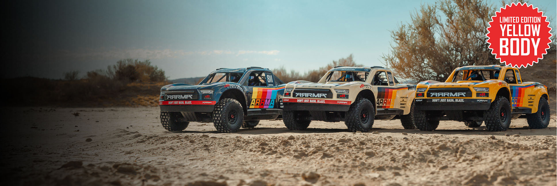 Action shot of the ARRMA 1/7 MOJAVE 6S lineup in the desert