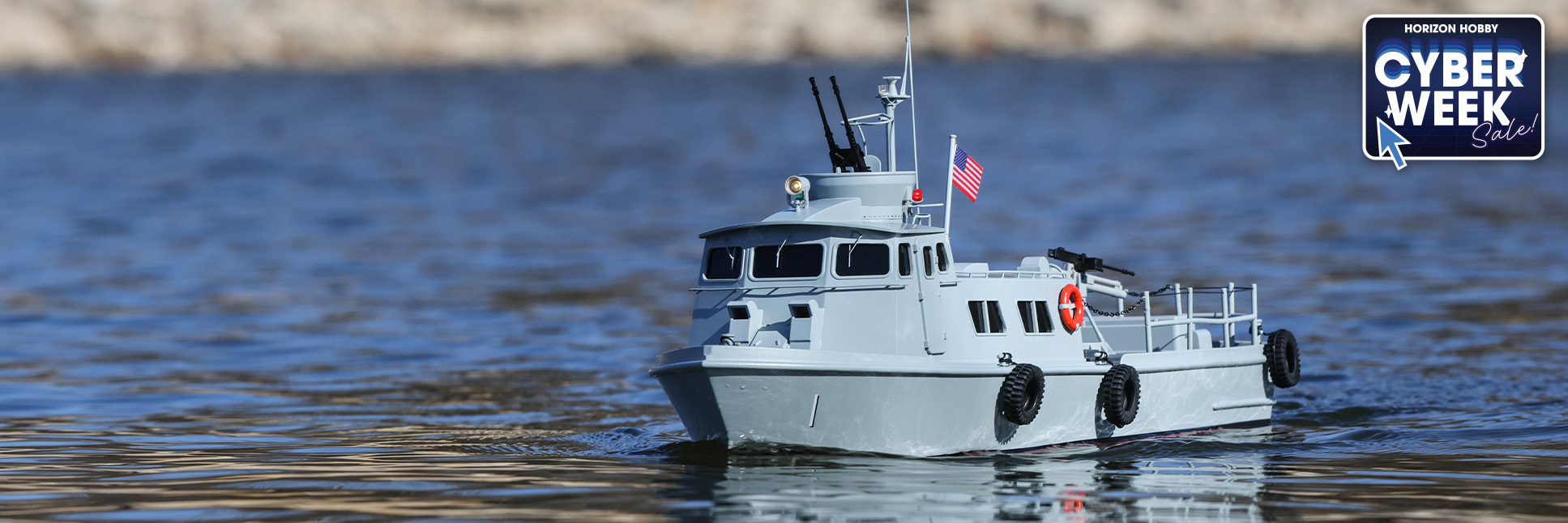 Action shot of the Pro Boat PCF Mk I 24” Swift Patrol Craft Ready-to-Run RC Boat with the Cyber Week Sale Logo