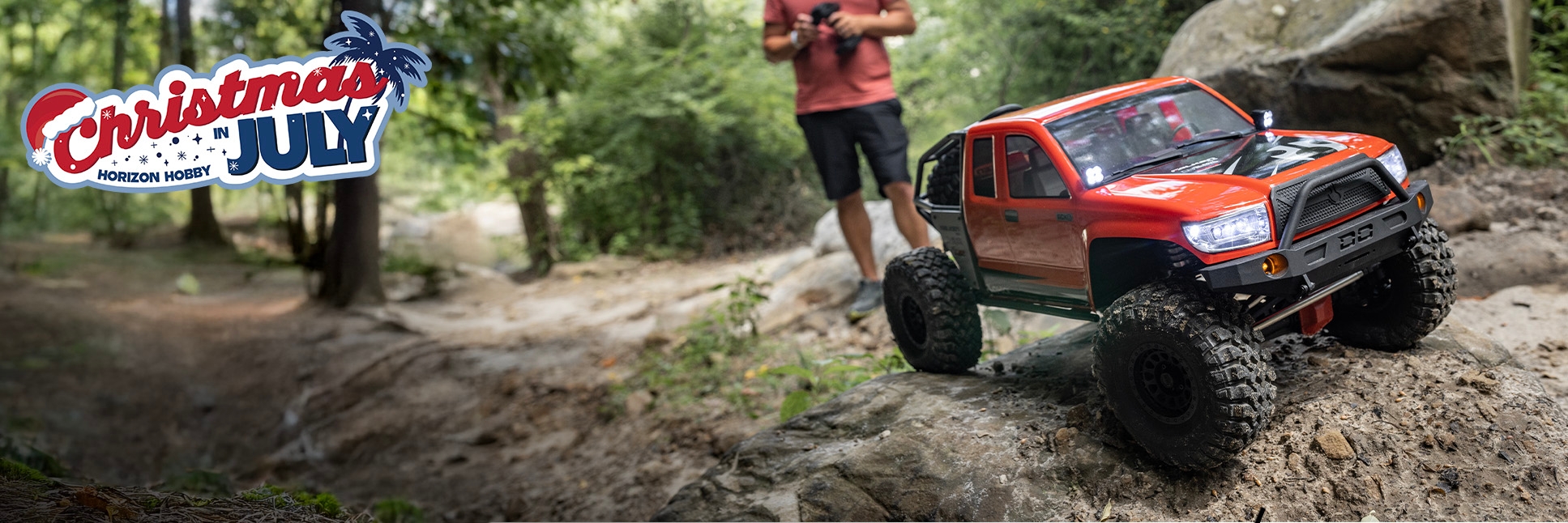 Axial 1/6 SCX6 Trail Honcho 4X4 Rock Crawler Ready-to-Run with the Christmas in July Sale Logo