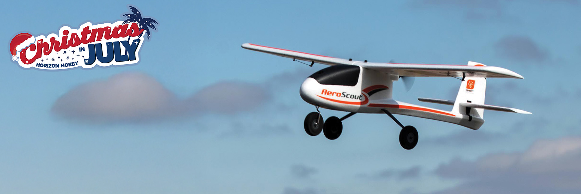 Action Shot of the HobbyZone AeroScout S 2 1.1m Ready-to-Fly Basic RC Airplane with SAFE with Christmas In July Sale Logo Action Shot of the HobbyZone AeroScout S 2 1.1m Ready-to-Fly Basic RC Airplane with SAFE with Christmas In July Sale Logo