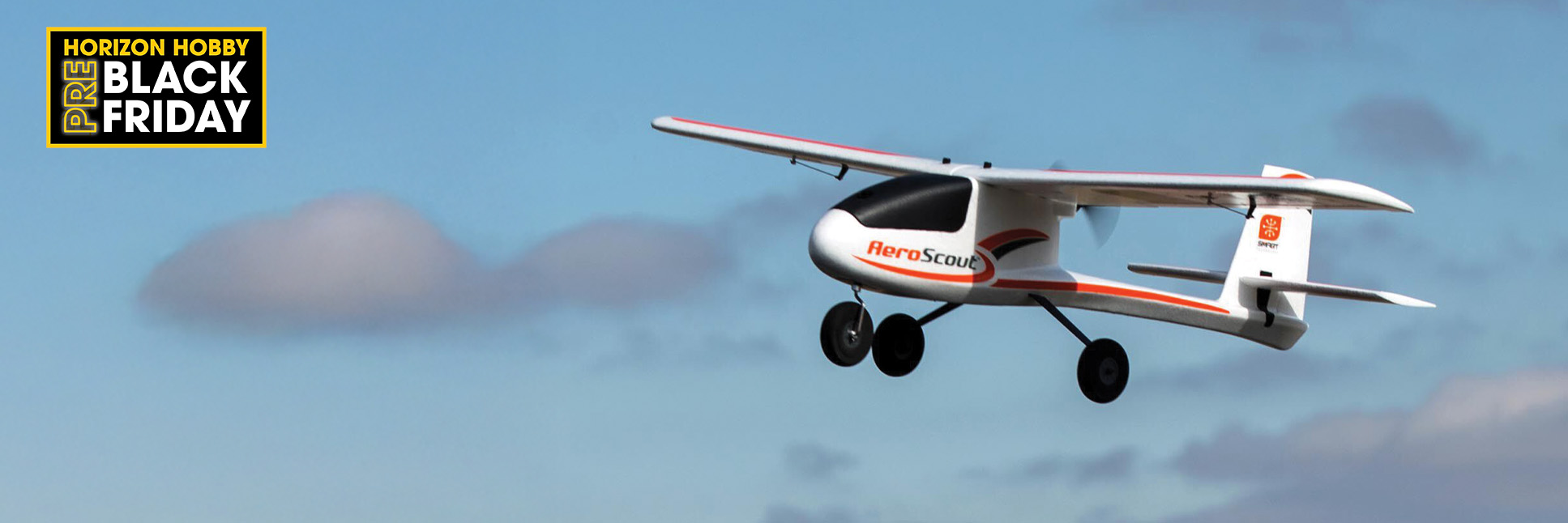 Action shot of HobbyZone AeroScout S 2 1.1m Ready-to-Fly Basic RC Trainer Airplane with SAFE flying through the sky and with the Horizon Hobby Pre-Black Friday Logo Action shot of HobbyZone AeroScout S 2 1.1m Ready-to-Fly Basic RC Trainer Airplane with SAFE flying through the sky and with the Horizon Hobby Pre-Black Friday Logo