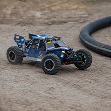 Losi RC Buggy on a dirt track during the figure 8 RC Racing event