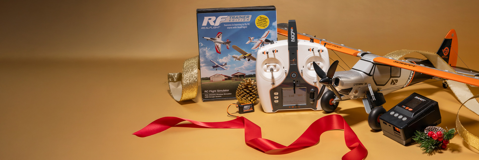 Glamour shot of the E-flite Micro Scrappy 800mm BNF Basic Ultimate Combo with a festive holiday themed background