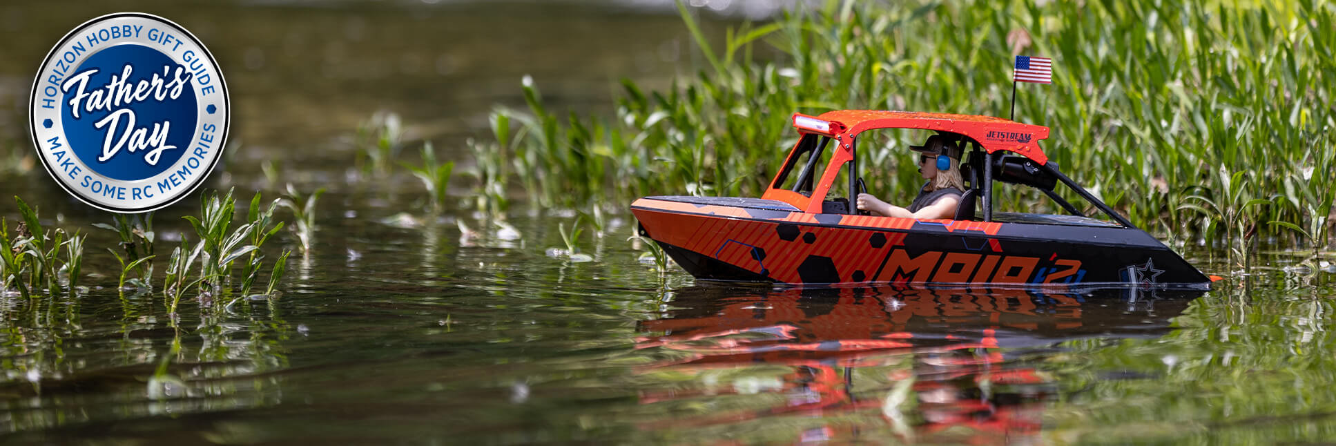 Action Shot of Pro Boat 1/6 scale 24 inch Jetstream Mojo Livery Ready-to-Run RC Jet Boat with Horizon Hobby Father's Day 2025 Logo