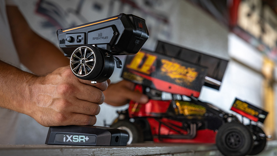 Lifestyle shot of the Spektrum iXSR+ 12-Channel DSMR+ Transmitter