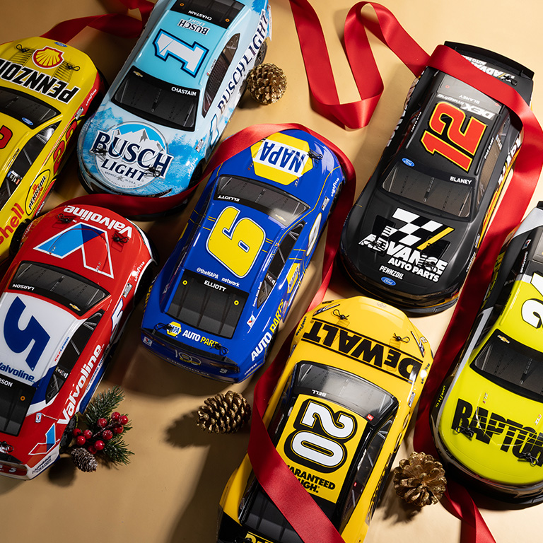 Losi NASCAR RC Race Car Group Image with festive holiday themed background