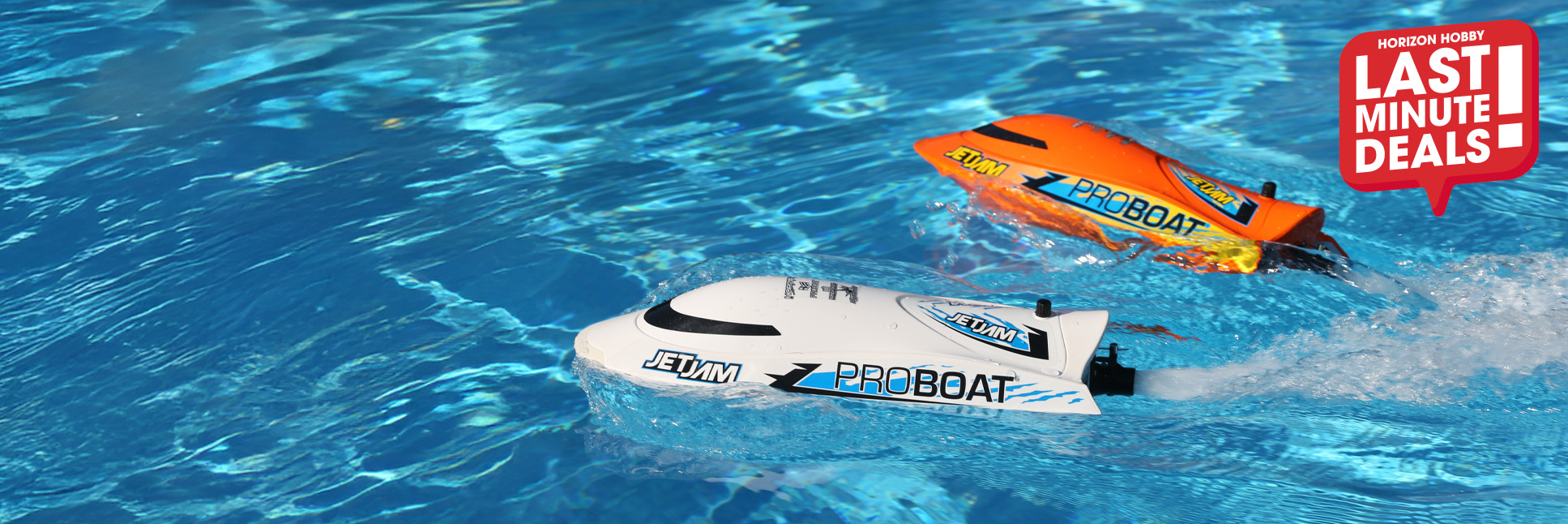 Action shot of the Pro Boat Jet Jam V2 12" Self-Righting Pool Racer Brushed Ready-To-Run RC boat floating in a pool of water with the Last Minute Deals logo