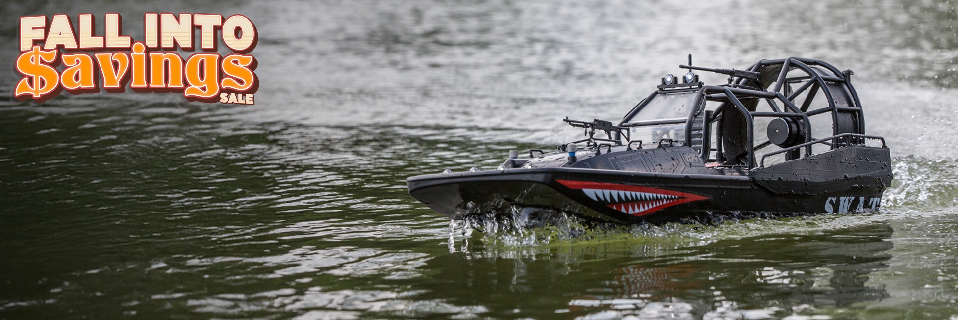 Action Shot of the Pro Boat Aerotrooper 25" Brushless Ready-to-Run RC Air Boat on water with the Fall Into Savings Sale Logo Action Shot of the Pro Boat Aerotrooper 25" Brushless Ready-to-Run RC Air Boat on water with the Fall Into Savings Sale Logo