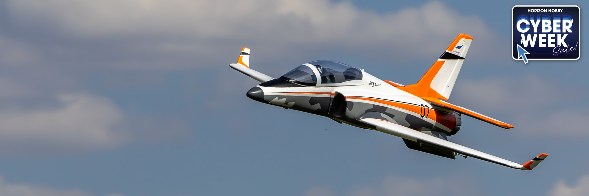 Action shot of the E-flite Viper 64mm EDF Jet Bind-N-Fly Basic RC Jet with AS3X+ and SAFE Select flying through the sky with the Cyber Week Sale Logo Action shot of the E-flite Viper 64mm EDF Jet Bind-N-Fly Basic RC Jet with AS3X+ and SAFE Select flying through the sky with the Cyber Week Sale Logo