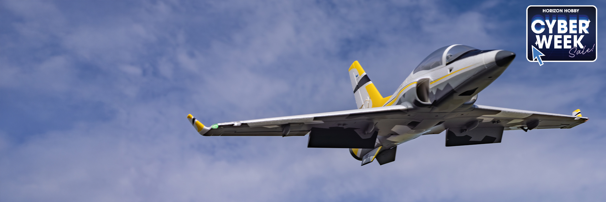 Action shot of the E-flite Viper 64mm EDF Jet Bind-N-Fly Basic RC Jet with AS3X+ and SAFE Select flying through the sky with the Cyber Week Sale Logo