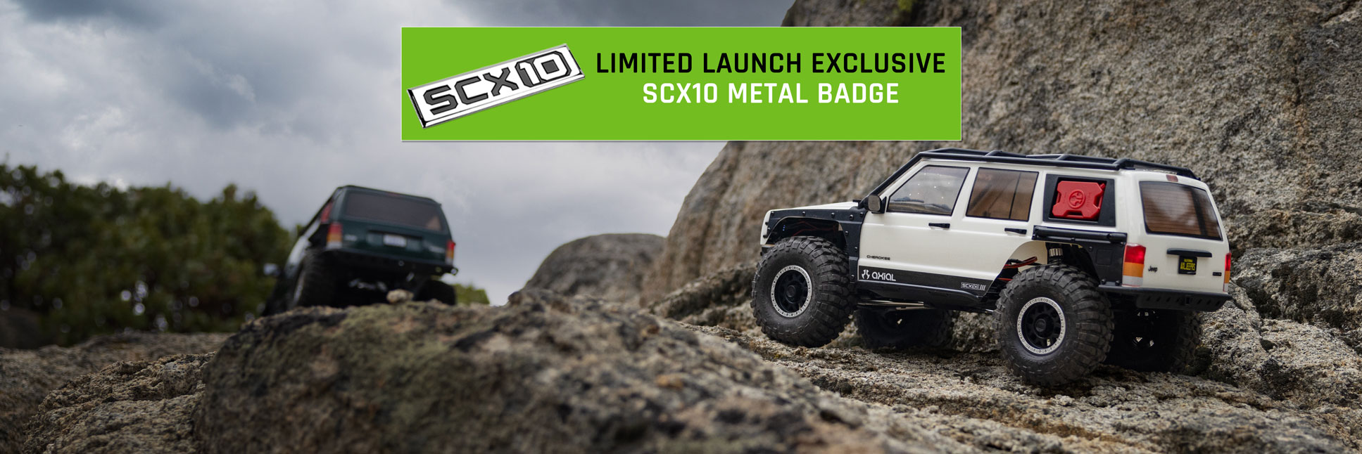 Action shot of the 1/10 Axial SCX10 III Jeep Cherokee XJ climbing over boulders