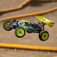 Team Losi Racing TLR RC Buggy on a dirt oval track for during the 1/8 scale off-road race