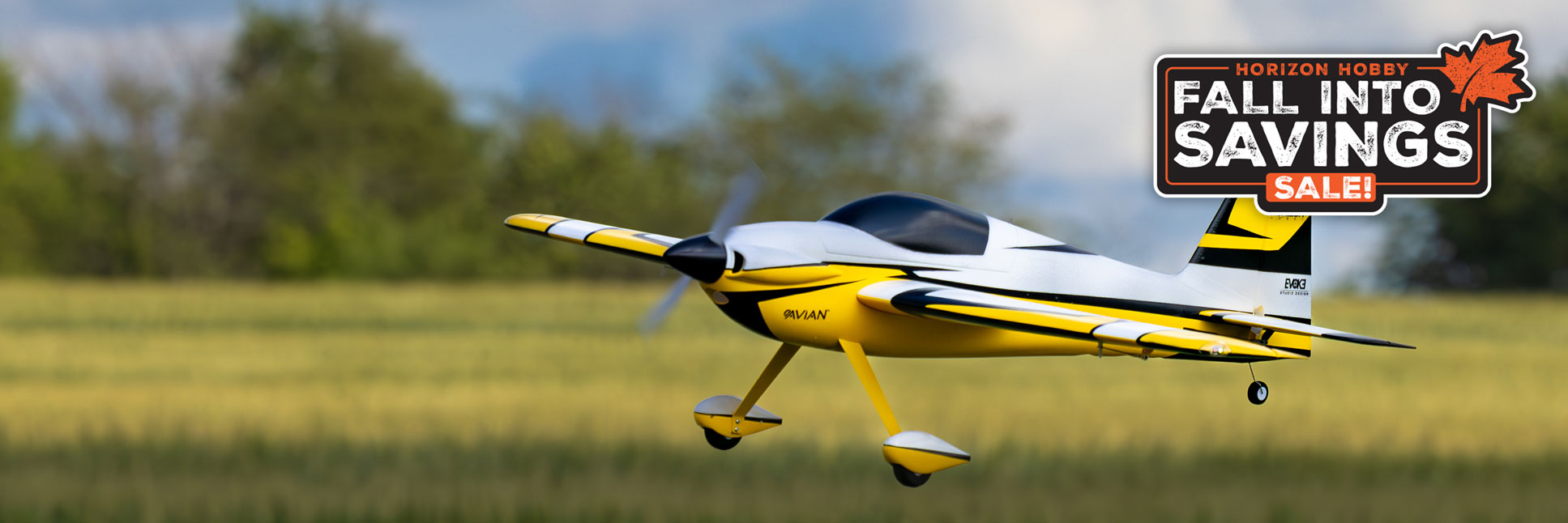 Action shot of the E-flite Sportix 1.1m BNF Basic RC airplane flying through the sky with the Horizon Hobby Fall Into Savings Logo Action shot of the E-flite Sportix 1.1m BNF Basic RC airplane flying through the sky with the Horizon Hobby Fall Into Savings Logo
