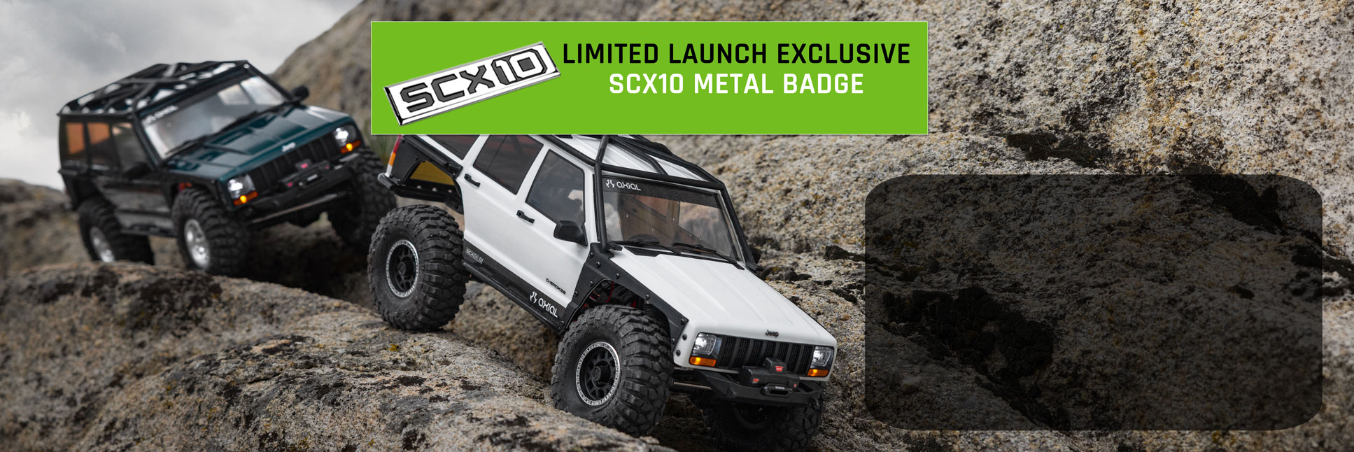 Action shot of the 1/10 Axial SCX10 III Jeep Cherokee XJ climbing over boulders