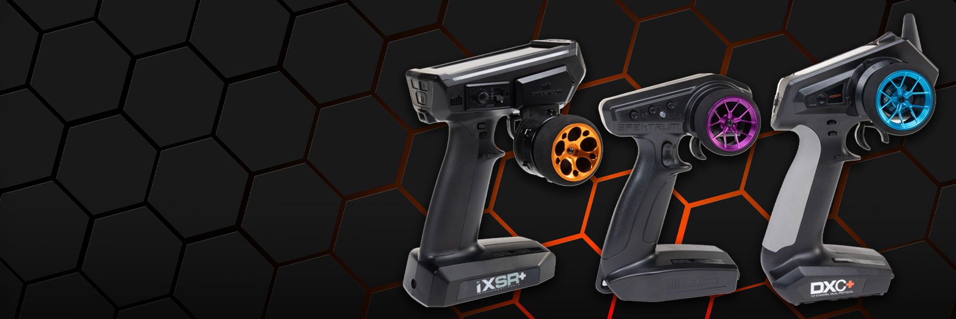 Spektrum RC Surface Transmitters with Aluminum Upgrade Steering Wheels on a black hex pattern background Spektrum RC Surface Transmitters with Aluminum Upgrade Steering Wheels on a black hex pattern background