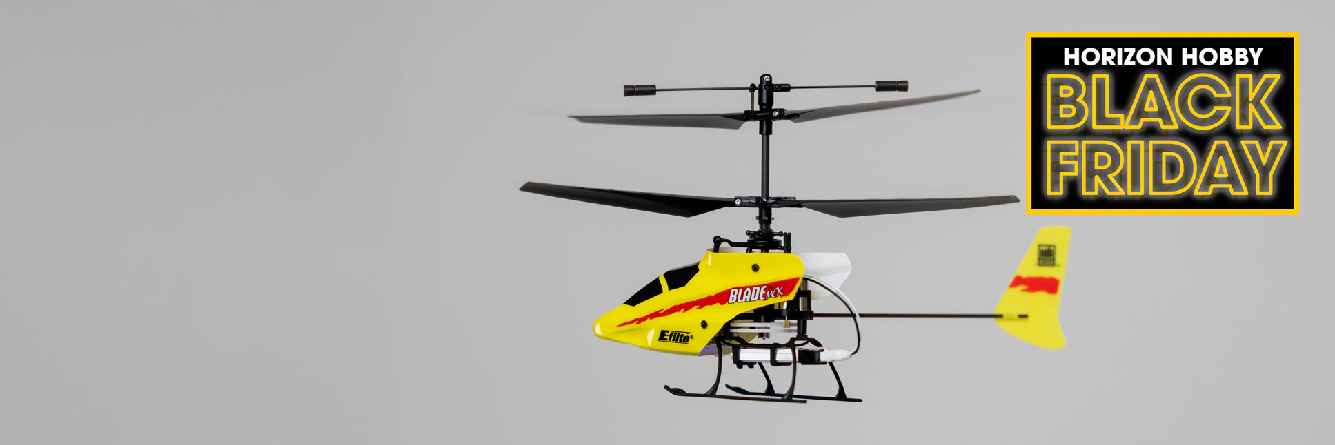 Blade mCX Anniversary Special Edition Ready-to-Fly RC helicopter flying in the living room with the Black Friday logo