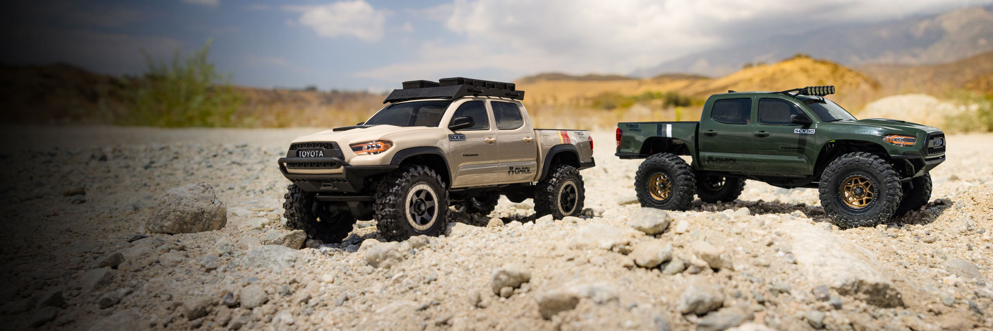 Action shot of the 1/30 Axial SCX30 Toyota Tacoma RC Rock Crawler on dirt terrain