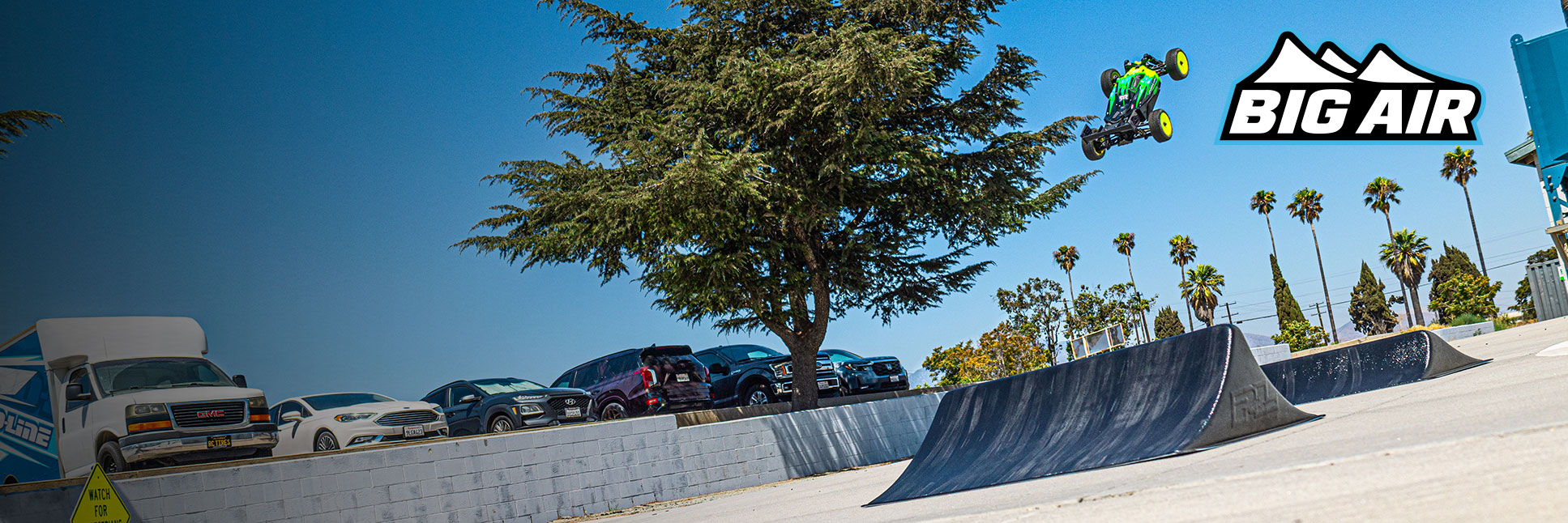 Pro-Line Big Air Triple RC Ramp Set with action shot of an RC Buggy in mid air Pro-Line Big Air Triple RC Ramp Set with action shot of an RC Buggy in mid air