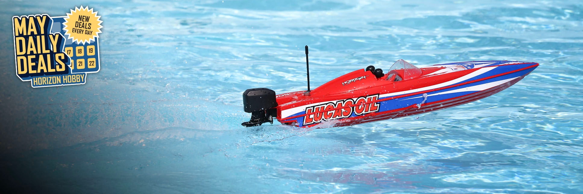 Action shot of Pro Boat Lucas Oil 17 inch Power RC Boat Racer Self-Righting Deep-V Ready-to-Run with the May Daily Deals Logo