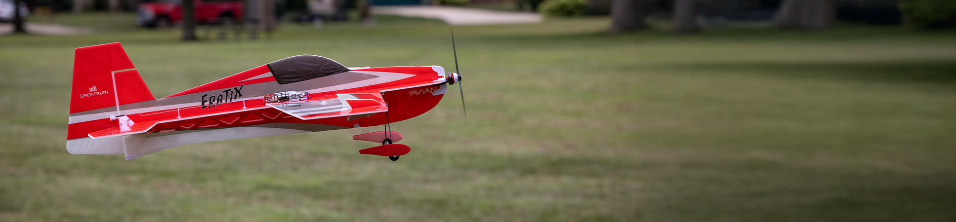 Action shot of the E-flite UMX Eratix 3D FF (Flat Foamy) 450mm Bind-N-Fly Basic RC Airplane with AS3X and SAFE Select flying through the sky and performing a 3D aerobatic move Action shot of the E-flite UMX Eratix 3D FF (Flat Foamy) 450mm Bind-N-Fly Basic RC Airplane with AS3X and SAFE Select flying through the sky and performing a 3D aerobatic move