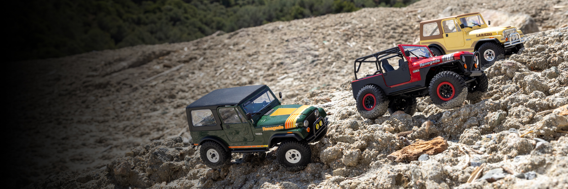 Action shot of the 1/30 Axial SCX30 Jeep CJ-7 RC Rock Crawler crawling over rocks Action shot of the 1/30 Axial SCX30 Jeep CJ-7 RC Rock Crawler crawling over rocks