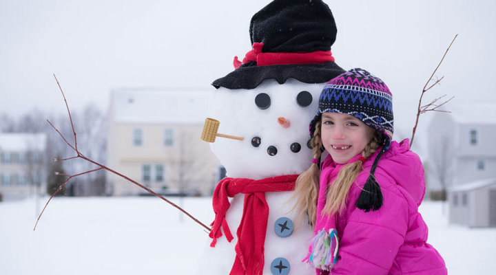 Kathy-Wolfe-girl-and-snowman.low.jpg