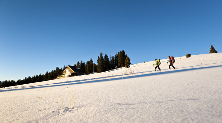 Michael-Clark-skiers-walking.low.jpg