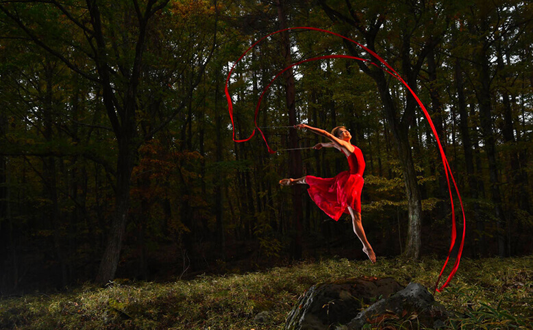 Professional photograph of a dancer in the woods