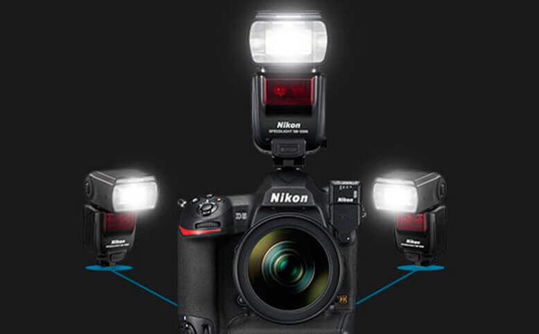 Nikon Speedlights externally attached to a camera