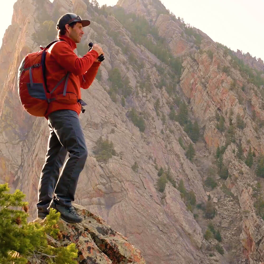Person overlooking a mountain with Prostaff P7 Binoculars