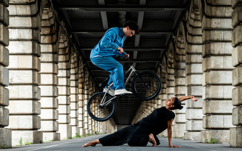 bike rider jumping over a person on the ground, taken with the NIKKOR Z 24-70mm f/2.8 S II lens, showing AF capabilities