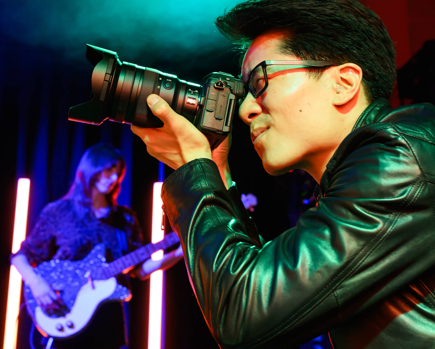 Nikon Ambassador Todd Owyoung looks through the viewfinder while photographing with the Z5II.