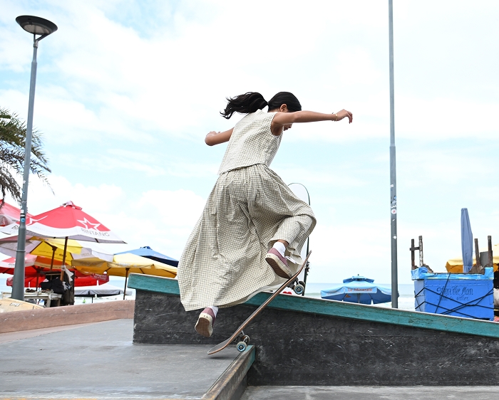 photo of a skateboarder on a street, taken with the NIKKOR Z DX 16-50mm f/2.8 VR lens