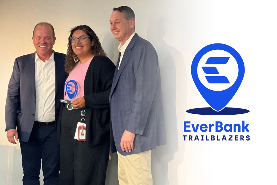 EverBank Builds Trailblazer Award, presented to Madai Carey by EverBank CEO Greg Seibly and EverBank President David DePillo. 