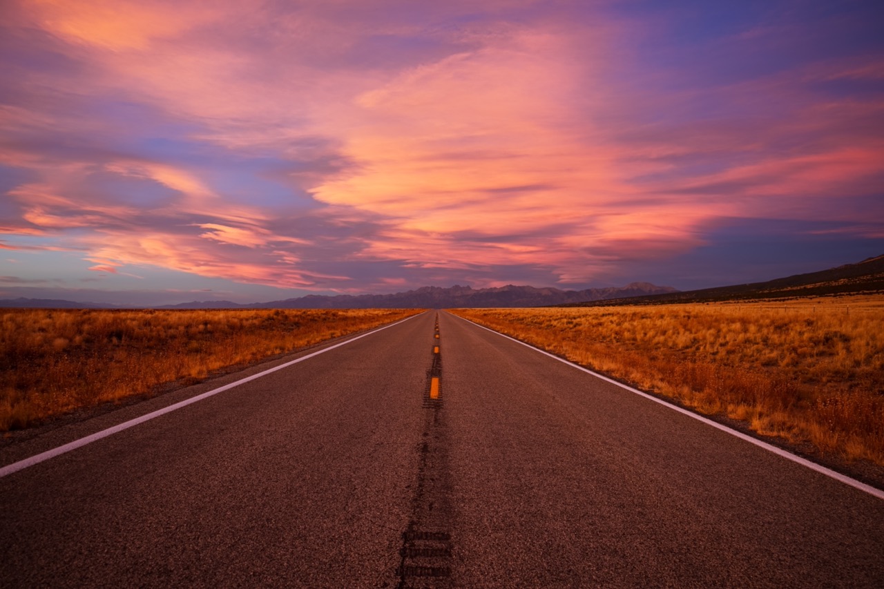 Open road leading into sunset Large.jpeg