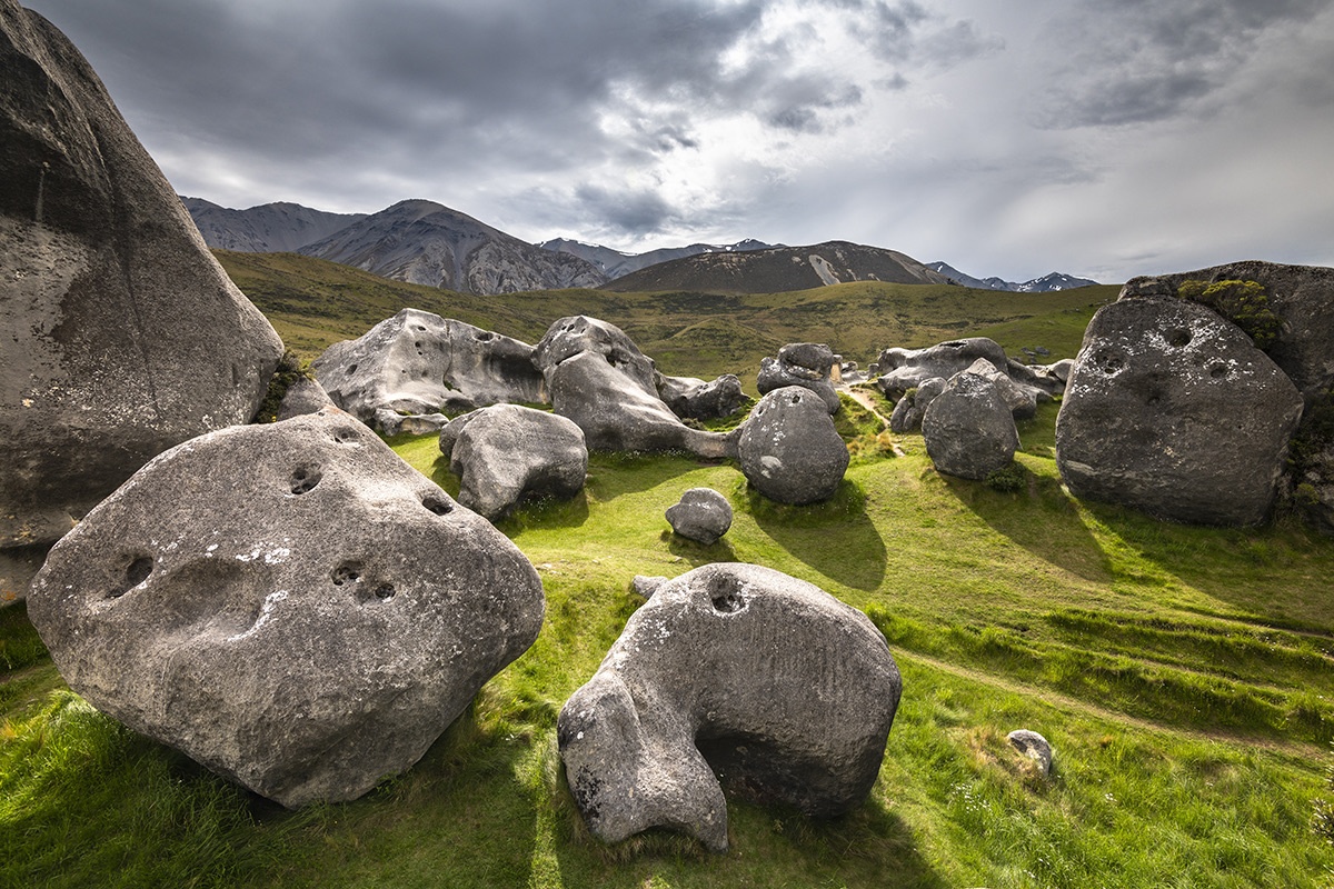 Castle_Hill_limestone_boulders_with_people_climbing_(1).jpeg