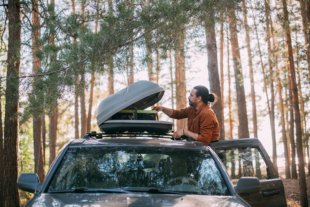 Packed SUV with roof box in NZ countryside (1).jpg