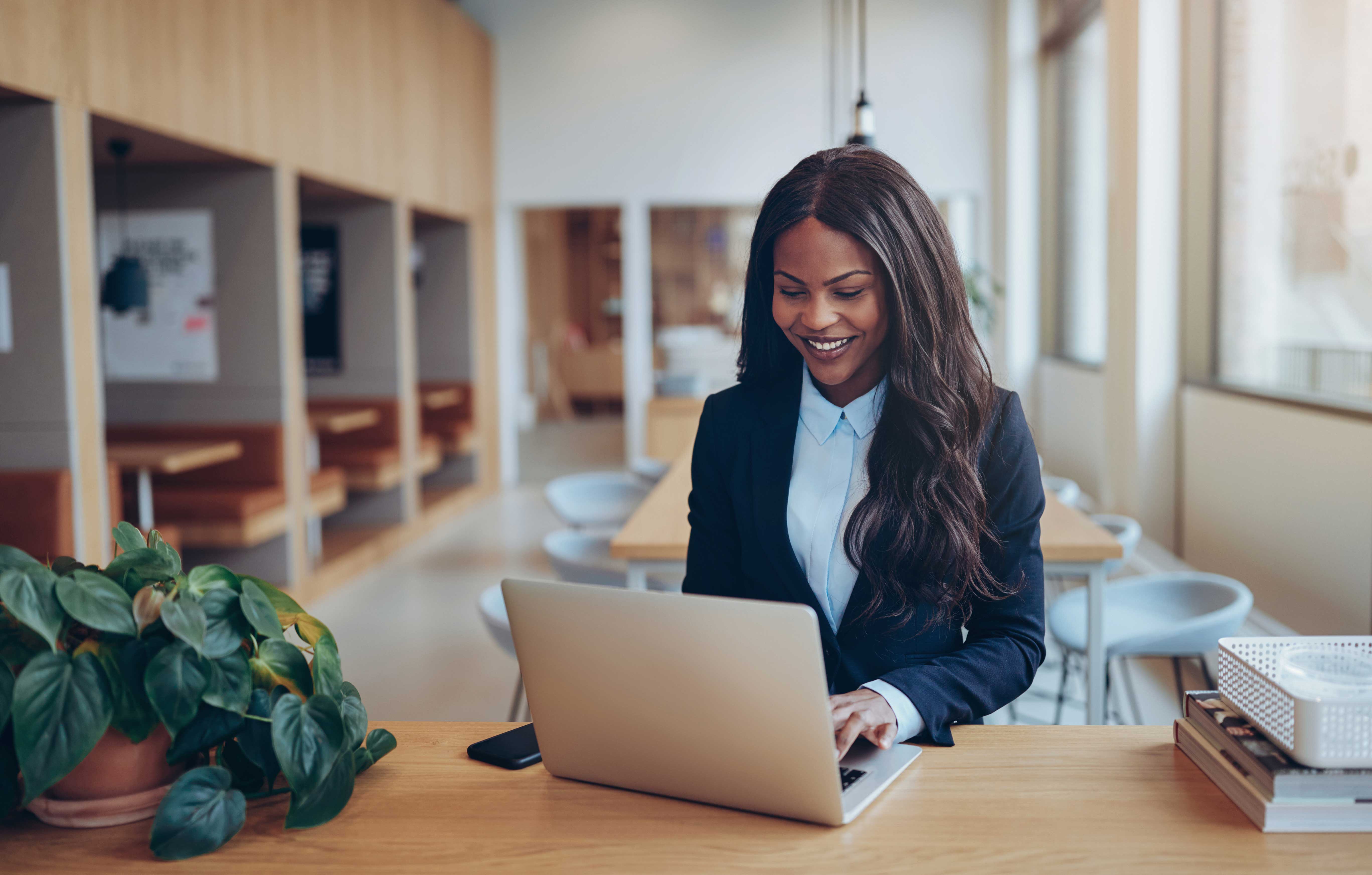 woman looking a computer