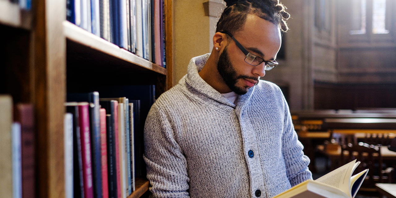 A college student researching the about how to receive and payback student loans.