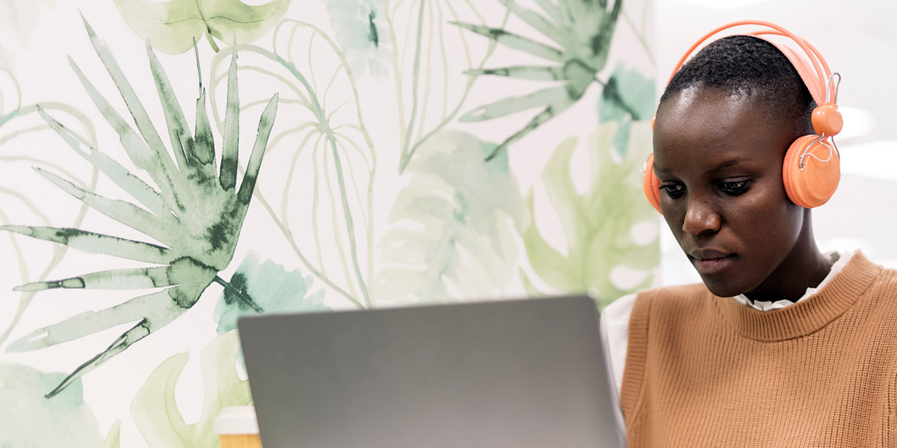Woman studying online about the importance of credit scores.