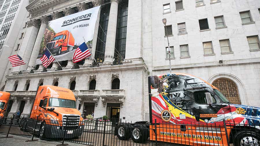 Schneider truck parked in front of the New York Stock Exchange