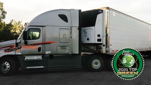 Schneider tractor and trailer parked.