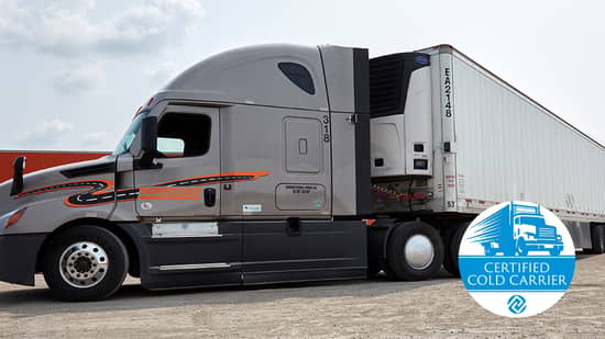 A Schneider tracter hauling a refrigerated trailer with the Certified Cold Carrier logo in the bottom right of the image