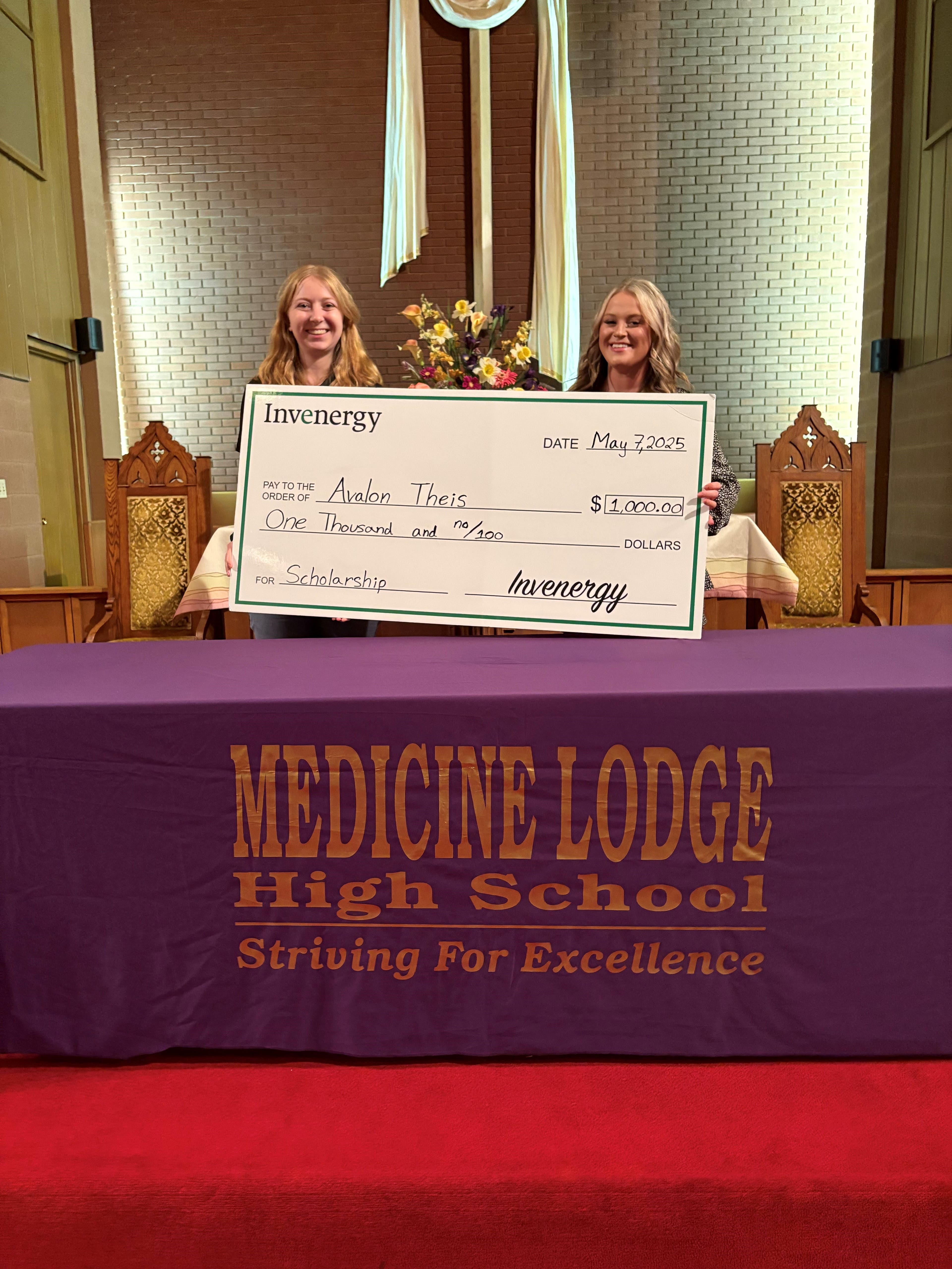 Invenergy presents a local student with scholarship