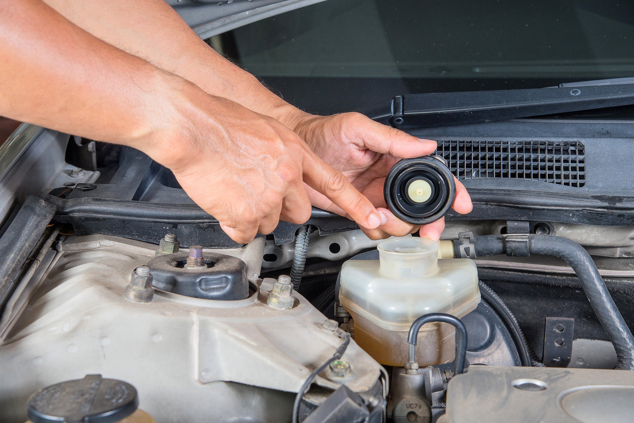 Should Car Be Running When Adding Brake Fluid: Essential Safety Tips