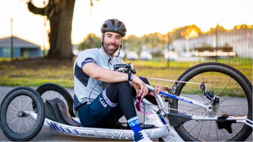 Cyclist sitting in handcycle