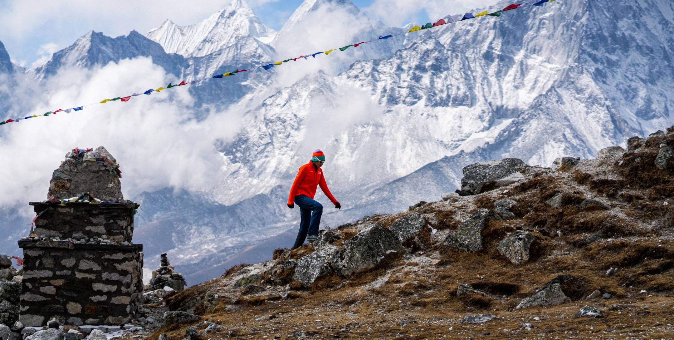 Climber treks up a beautiful mountainous path