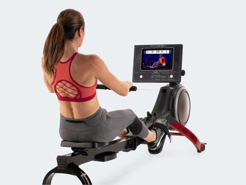 Woman uses rower